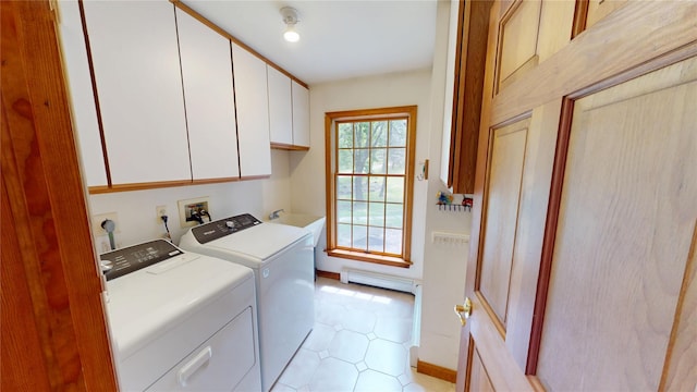 11 Hidden Meadow Rd, Warwick, NY 10990 - laundry room featuring cabinet space, separate washer and dryer, baseboard heating, and light tile patterned floors