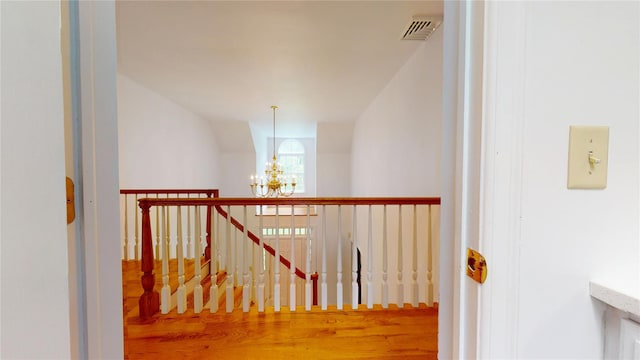 11 Hidden Meadow Rd, Warwick, NY 10990 - stairway with a chandelier and wood finished floors