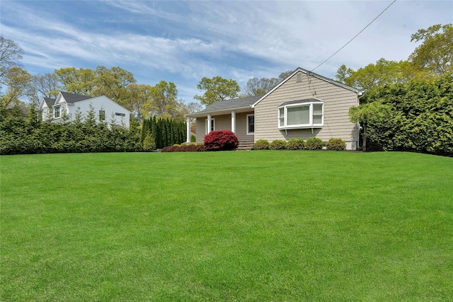 view of front of home with a front yard