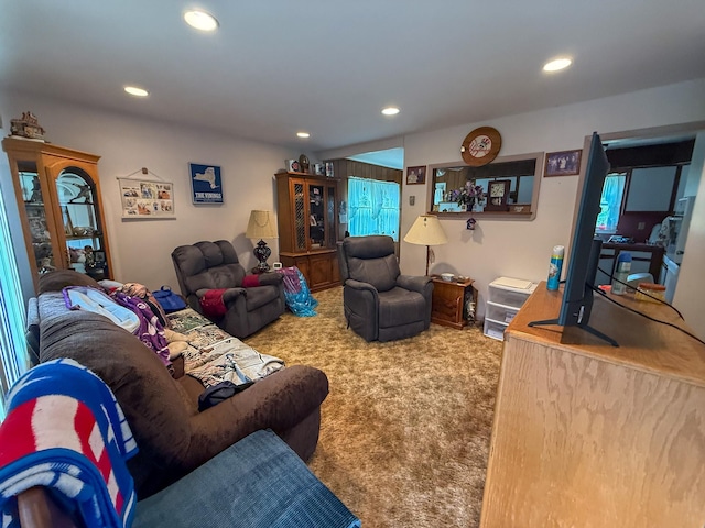 carpeted living room with recessed lighting