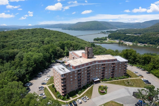 1 Lakeview Dr Unit 1L, Peekskill, NY 10566 - drone / aerial view of a forest, a water and mountain view, and apartment complex / building