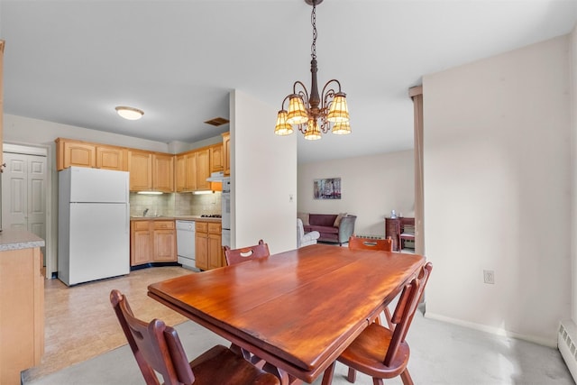 1 Lakeview Dr Unit 1L, Peekskill, NY 10566 - dining space with a chandelier, baseboard heating, and baseboards