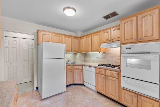 1 Lakeview Dr Unit 1L, Peekskill, NY 10566 - kitchen featuring white appliances, a warming drawer, under cabinet range hood, light brown cabinetry, and a sink