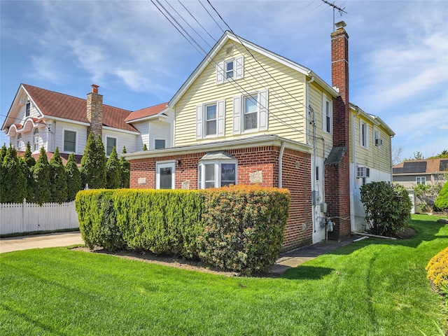 1994 Pine St, North Baldwin, NY 11510 - view of front of property with brick siding and a chimney
