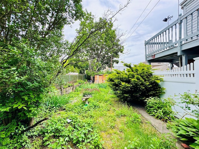 68-11 52nd Dr, Maspeth, NY 11378 - view of yard featuring fence