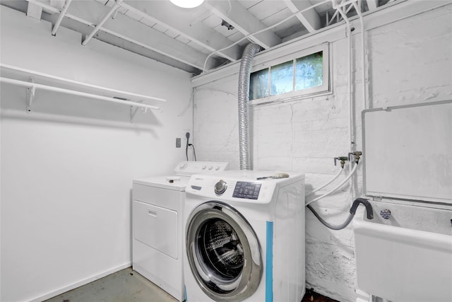 30 Inwood Rd, Glen Cove, NY 11542 - washroom featuring independent washer and dryer, concrete block wall, and laundry area
