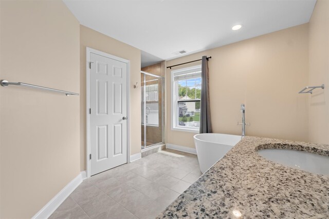 32 N Ridge Rd, Mahopac, NY 10541 - full bathroom featuring a shower stall, a freestanding bath, tile patterned flooring, baseboards, and recessed lighting