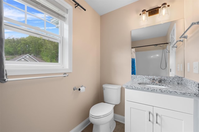 32 N Ridge Rd, Mahopac, NY 10541 - full bathroom with baseboards, vanity, toilet, a shower with shower curtain, and tile patterned floors