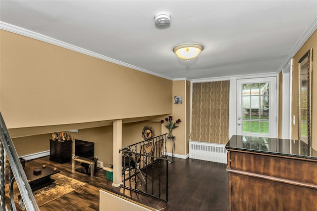 31 Elmwood Ct, Plainview, NY 11803 - entryway with radiator, crown molding, wood finished floors, baseboard heating, and baseboards