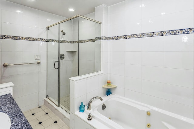 31 Elmwood Ct, Plainview, NY 11803 - full bath featuring tile walls, a stall shower, a tub with jets, tile patterned floors, and recessed lighting