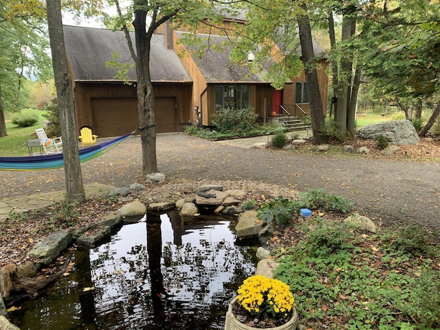 117 Dusinberre Rd, Gardiner, NY 12525 - southwest-style home with a garage and aphalt driveway