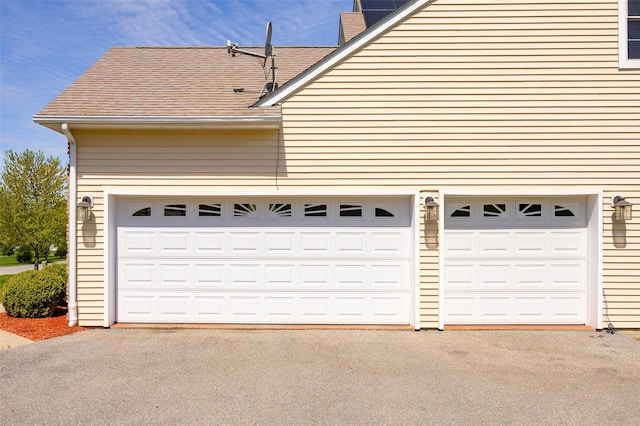 garage with driveway