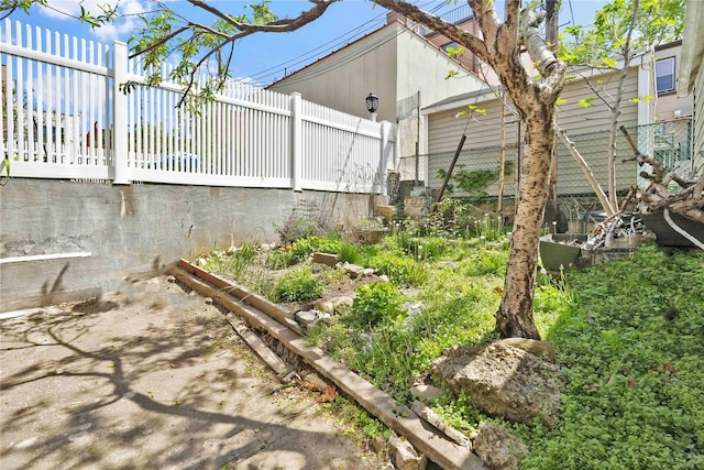view of yard with fence