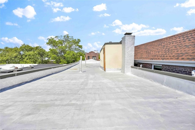 exterior space with a flat roof