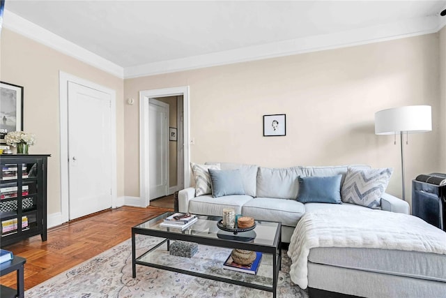 living room featuring baseboards and ornamental molding