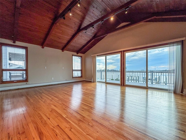 208 Block Ln, Harbor Isle, NY 11558 - unfurnished living room with track lighting, wood ceiling, light wood-style flooring, baseboards, and a baseboard heating unit