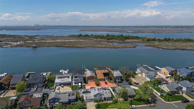 208 Block Ln, Harbor Isle, NY 11558 - aerial perspective of suburban area featuring a nearby body of water