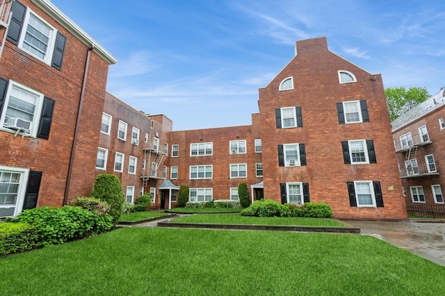 view of apartment building / complex with cooling unit