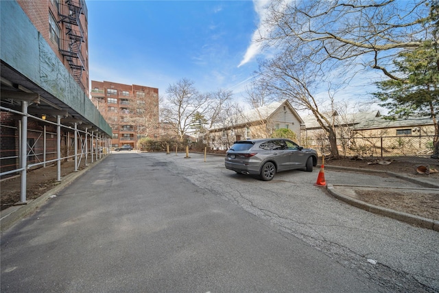 view of street with curbs