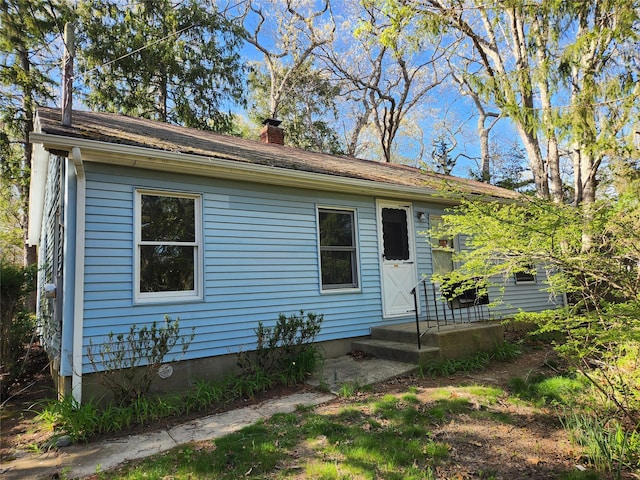 view of front of property with a chimney