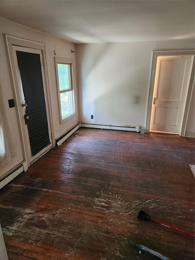 interior space featuring a baseboard radiator and hardwood / wood-style flooring