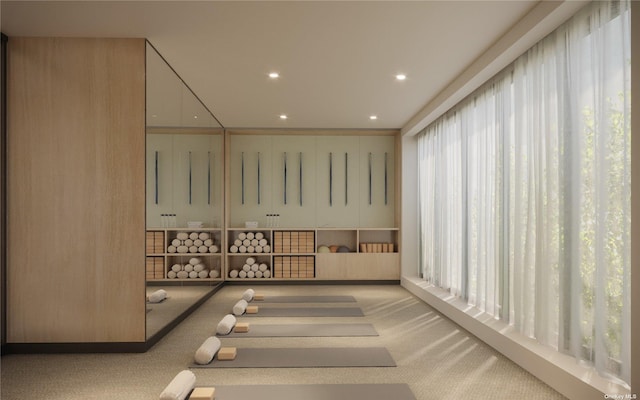 interior space featuring carpet flooring and recessed lighting