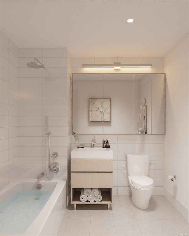bathroom with vanity, tile patterned floors, bathing tub / shower combination, and toilet