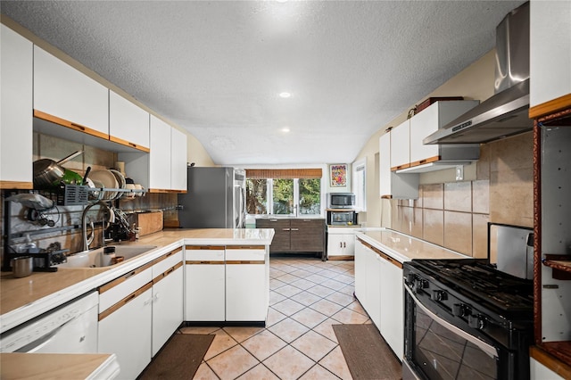 211 Cantiague Rock Rd, Westbury, NY 11590 - kitchen featuring stainless steel appliances, a sink, backsplash, light countertops, and white cabinets