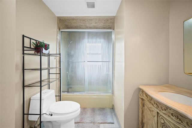 211 Cantiague Rock Rd, Westbury, NY 11590 - bathroom with vanity, toilet, visible vents, and enclosed tub / shower combo