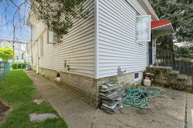 84-52 123rd St, Kew Gardens, NY 11415 - view of property exterior with fence