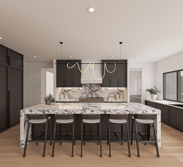 1629 Cedar Swamp Rd, Glen Head, NY 11545 - kitchen featuring tasteful backsplash, light stone countertops, a large island, and recessed lighting