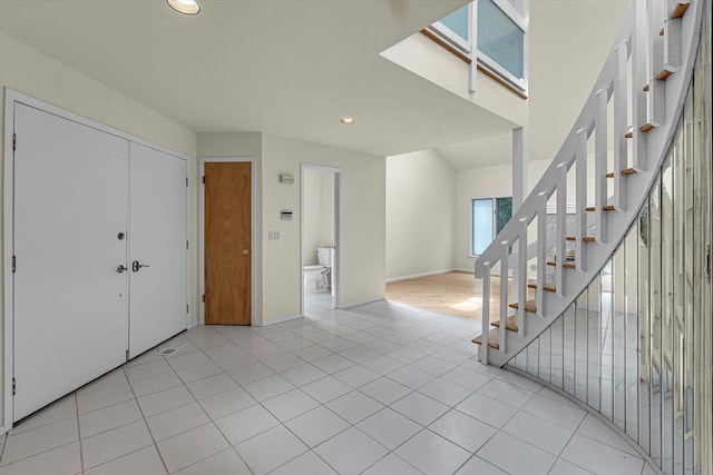 2 Heiko Ct, Northport, NY 11768 - foyer entrance with stairs, recessed lighting, light tile patterned floors, and baseboards