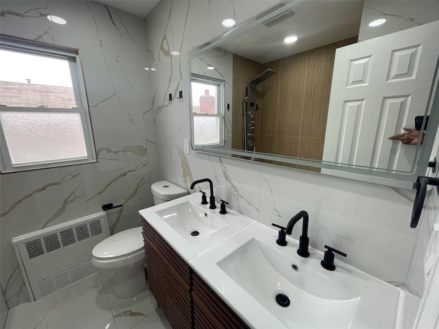 188-51 120th Rd, Saint Albans, NY 11412 - full bathroom featuring radiator, toilet, marble look tile flooring, and healthy amount of natural light