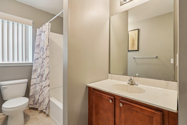 bathroom with toilet, vanity, and shower / bath combination with curtain