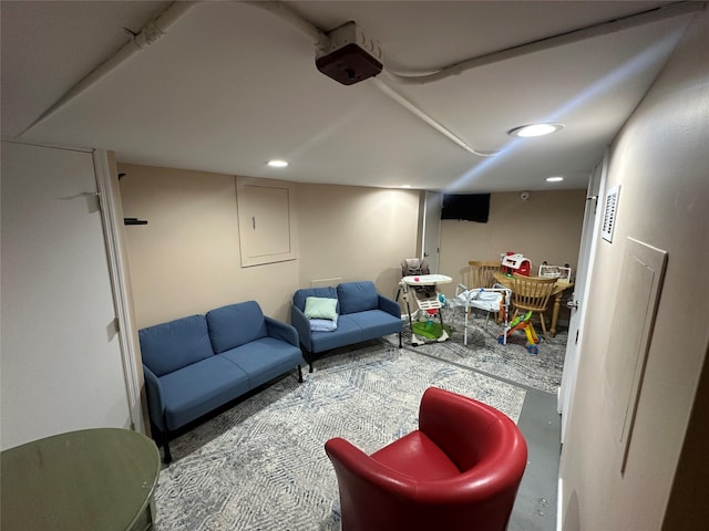 living area featuring recessed lighting