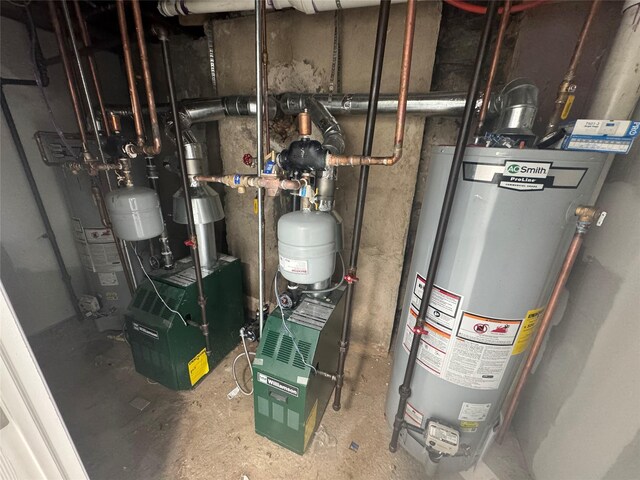 23-21 98th St, Flushing, NY 11369 - utility room with gas water heater