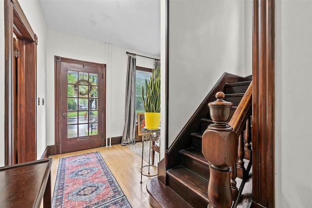 96 E Main St, Port Jervis, NY 12771 - foyer entrance with wood-type flooring and stairway