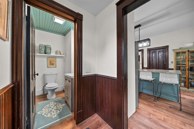 96 E Main St, Port Jervis, NY 12771 - bathroom with wood finished floors, toilet, and vanity