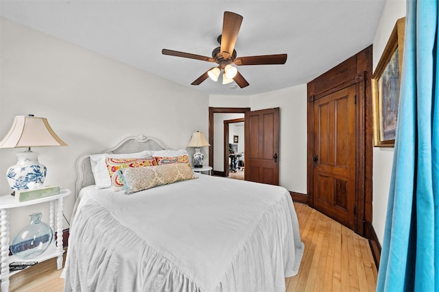 96 E Main St, Port Jervis, NY 12771 - bedroom with light wood-style flooring, a ceiling fan, and baseboards