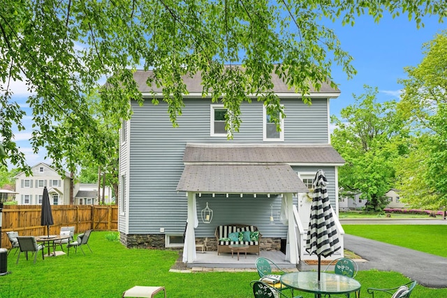 96 E Main St, Port Jervis, NY 12771 - back of property with roof with shingles, a patio area, central AC, and an outdoor hangout area