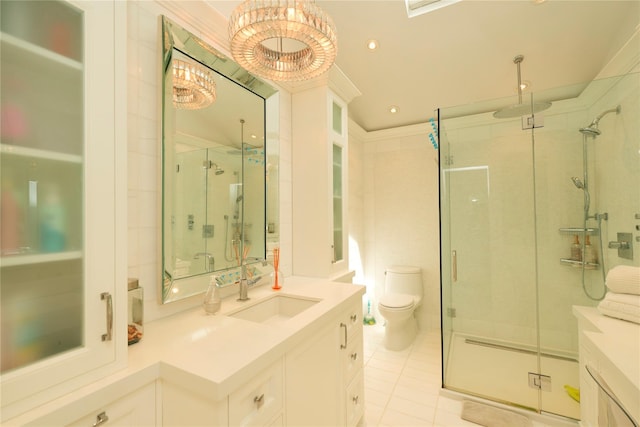 full bathroom with tile patterned flooring, vanity, toilet, and a shower stall