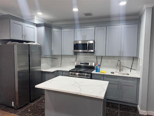 527 E 5th St, Brooklyn, NY 11218 - kitchen featuring gray cabinetry, marble finish floor, visible vents, a sink, and appliances with stainless steel finishes