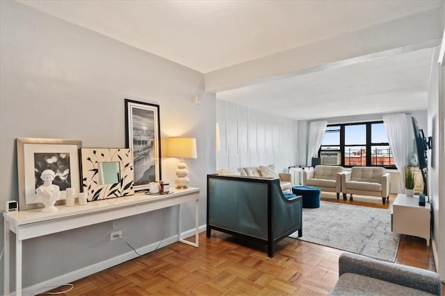 living room featuring baseboards