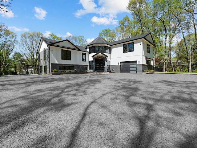 5 N Hills Rd, East Norwich, NY 11732 - view of front of property featuring an attached garage and brick siding