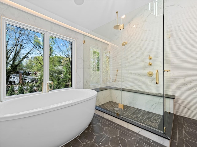 5 N Hills Rd, East Norwich, NY 11732 - bathroom featuring a freestanding tub, a marble finish shower, and plenty of natural light