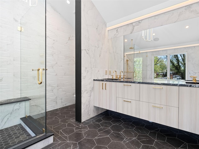 5 N Hills Rd, East Norwich, NY 11732 - full bath featuring double vanity, a marble finish shower, marble tiled flooring, tile walls, and recessed lighting