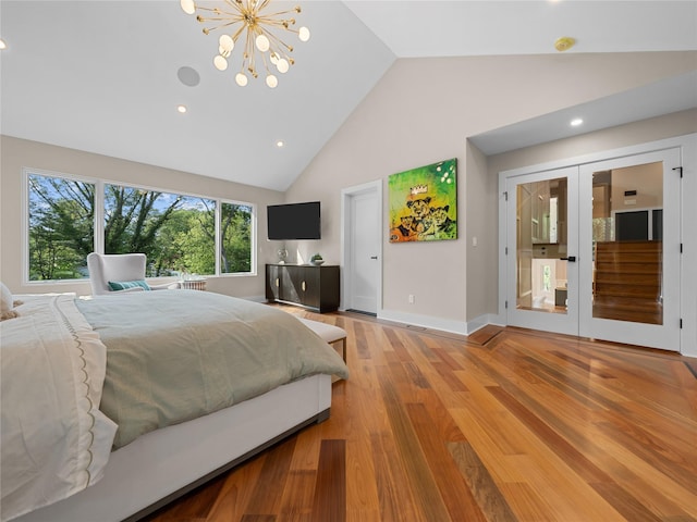 5 N Hills Rd, East Norwich, NY 11732 - bedroom with wood finished floors, high vaulted ceiling, baseboards, recessed lighting, and a chandelier