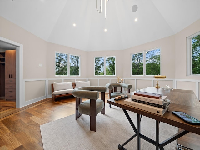 5 N Hills Rd, East Norwich, NY 11732 - living area featuring high vaulted ceiling, wood finished floors, wainscoting, a decorative wall, and recessed lighting