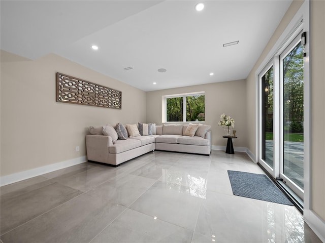 5 N Hills Rd, East Norwich, NY 11732 - living area featuring healthy amount of natural light, baseboards, and recessed lighting