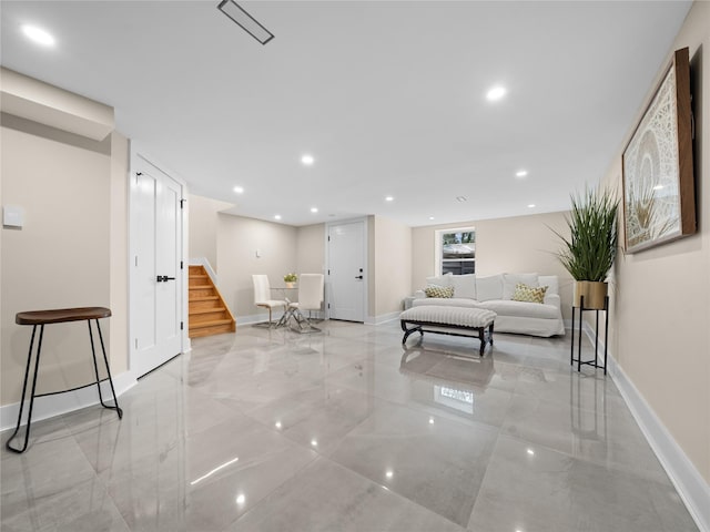 5 N Hills Rd, East Norwich, NY 11732 - living room with marble tiled flooring, baseboards, stairs, and recessed lighting